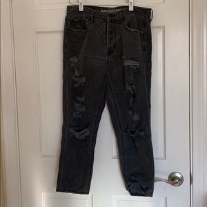 Grey loose jeans ripped as well
